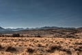 Foothills and Field Below Nevada Mountains Royalty Free Stock Photo