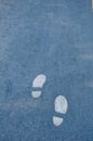 Footmark on the road Royalty Free Stock Photo