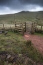 Footpath in Brecon Beacons landscape leading to Corn Du peak wit