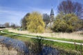 Footpath and church in Kethel in the Netherlands Royalty Free Stock Photo