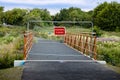 Footpath closed sign, with barriers blocking bridge for Cardross cyclepath