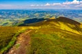 Footpath down the hill through mountain ridge Royalty Free Stock Photo