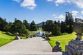 A footpath leading to lake with fountain, Sugerloaf mountain in the background, Wicklow, Ireland Royalty Free Stock Photo