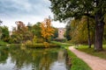 Footpath near lake in autumn park near Cesis town, Latvia Royalty Free Stock Photo