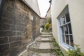 Footpath between old english country cottages in village Royalty Free Stock Photo