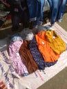 Footpath side shop jeans shirt sell on bike