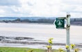 Footpath signpost for the Severn Way public path, near Sharpness on the banks of the River Severn, Gloucestershire, UK