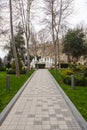 Footpath to modern fountain in park