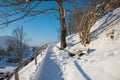 Footpath to the Weinberg hill, Schliersee tourist resort in winter