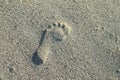 Footprint in black sand Royalty Free Stock Photo