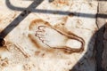 Footprint carved in marble in ancient Ephesus city, Turkey that show to the whorehouse Royalty Free Stock Photo