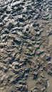 Footprint or imprint shoe in the mud.Mud texture or wet brown soil as natural organic clay and geological sediment