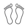 Footprint outline. Outline of two human footprints, symbolizing the concept of leaving a mark Royalty Free Stock Photo
