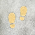 Footprint painted on the pavement, footpath, sidewalk