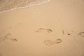 Footprint relax in summer time on sand beach island nature Royalty Free Stock Photo