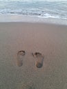 A footprint in the sand at Syiah Kuala Beach