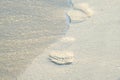 Footprint on white sand at the beach in sunset Royalty Free Stock Photo