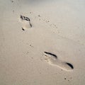 Footprints on the beach near Rewal in Poland