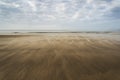 Footprints on beach Summer sunset landscape