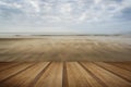 Footprints on beach Summer sunset landscape with wooden planks f