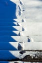 Footprints of boots on snowy steps