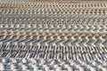 footprints of construction machine equipped with caterpillars on a building site