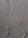 Footprints feet marks couple two peoples