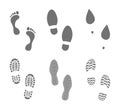 Footprints human shoes silhouette. Set of footprints and shoeprints icons in black showing bare feet and the imprint of the soles