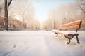 footprints leading to a bench, snow piled high Royalty Free Stock Photo