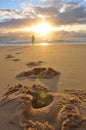 Footprints of lonely man on the beach. Footsteps on the sand. Royalty Free Stock Photo