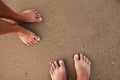 Footprints in love couple in the sand on the seashore