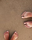 Footprints in love couple in the sand on the seashore