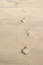 Stopy v piesok 