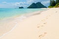 footprints in the sand along the sea on Poda island Royalty Free Stock Photo