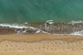 Footprints in the sand along the surf line. Background for title, picture for blog, decoration Royalty Free Stock Photo