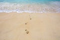 Footprints on a sand at the beach