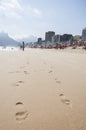 Footprints in the sand of Ipanema beach. Royalty Free Stock Photo