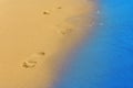 Footprints on sand of sea beach recreation, tourist, travel, ho