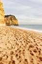 Footprints on a sandy Portuguese beach Royalty Free Stock Photo