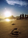 Footprints on the Shore of Ipanema Beach at Sunset Royalty Free Stock Photo