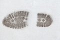 Imprint of shoes on white snow Royalty Free Stock Photo