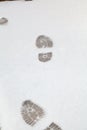 Imprint of shoes on white snow Royalty Free Stock Photo