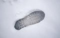 The footprints on the snow in cold winter are proof of human activity. Royalty Free Stock Photo