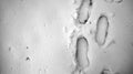 Footprints in the snow. Footprints on the first snow. Imprint an Royalty Free Stock Photo