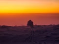 Footprints in snow and Silhouette, snowy mountain trees 01