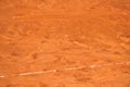 Footprints on a tennis clay court