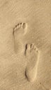 Footprints on the tropical white sand beach. Abstract life concept image. Royalty Free Stock Photo