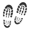 Footstep black silhouette, bootprint isolated on white background. Grunge track, symbol cartoon style. Royalty Free Stock Photo