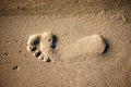 Footstep on sand on the beach Royalty Free Stock Photo