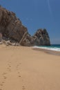 Footsteps in the sand at Lovers Beach in Cabo San Lucas, Mexico Royalty Free Stock Photo